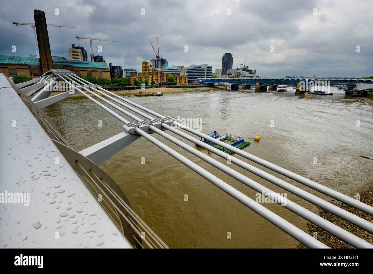 Bridge railing over the water in natural light Stock Photo - Alamy
