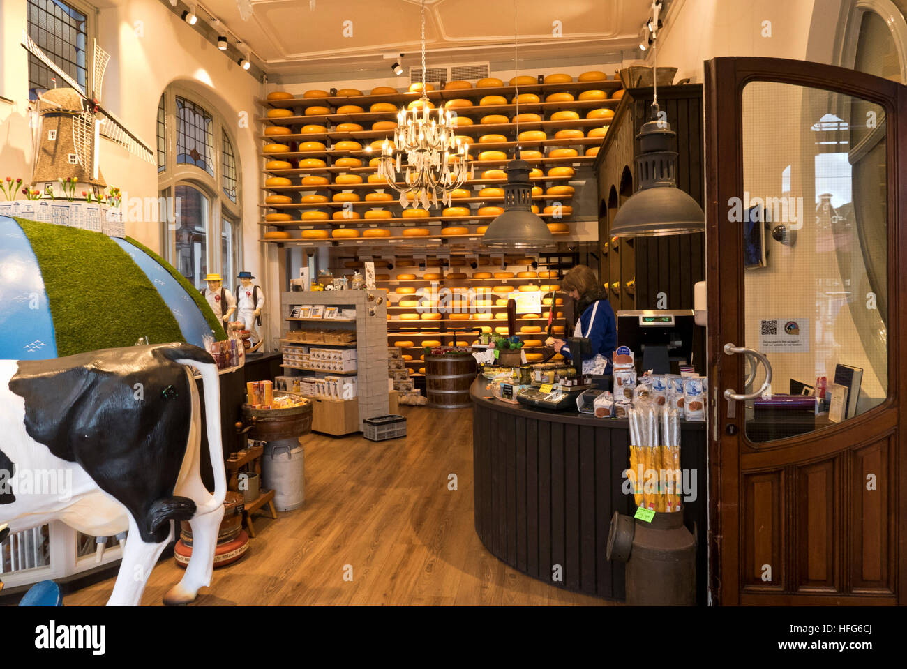 A large selection of cheese for sale on display in a shop in Amsterdam, Holland, Netherlands. Stock Photo