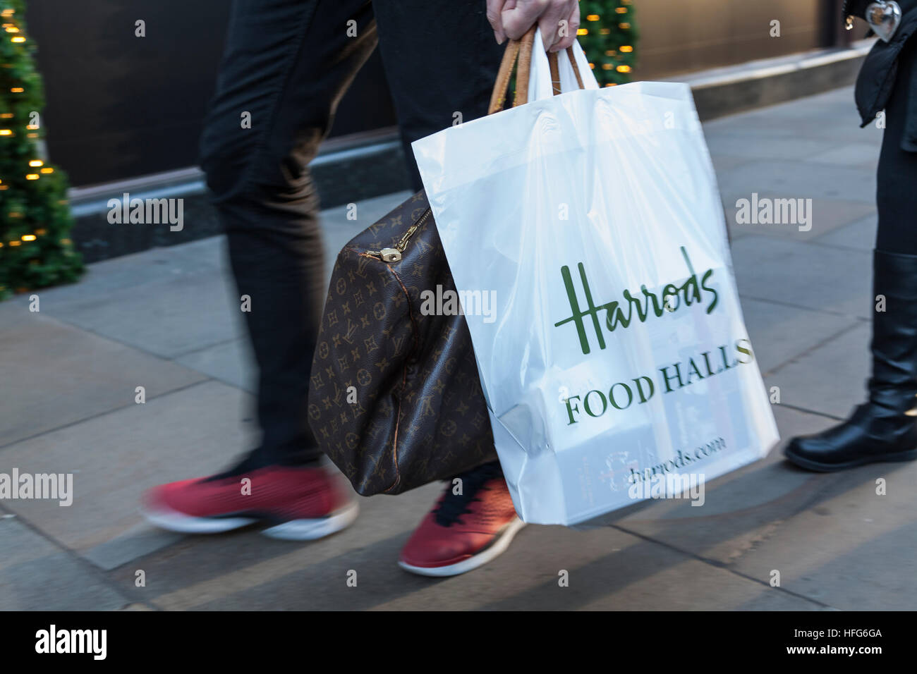 Harrods shopping bag Knightsbridge, London Stock Photo