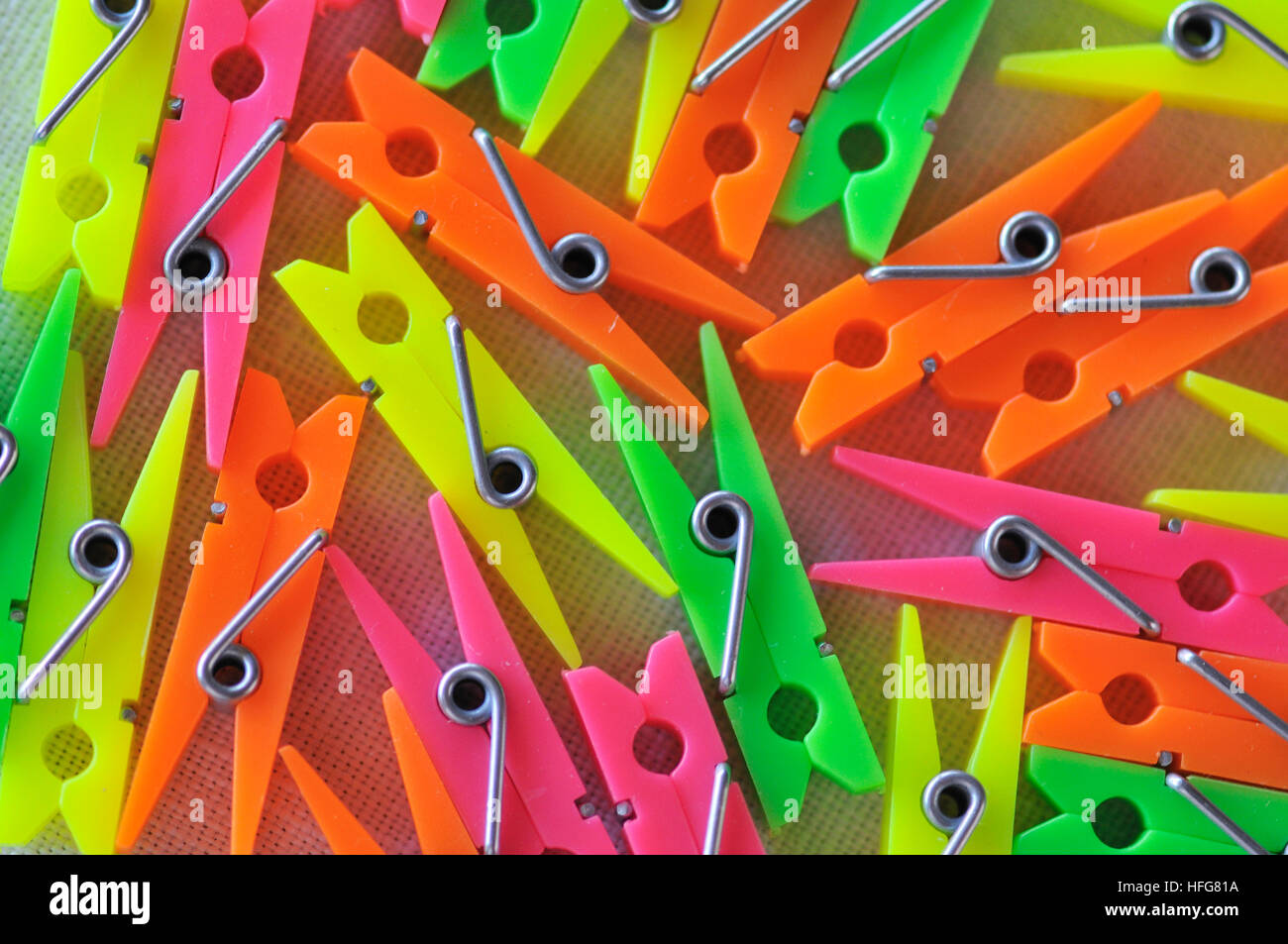 Plastic clothes pegs Stock Photo