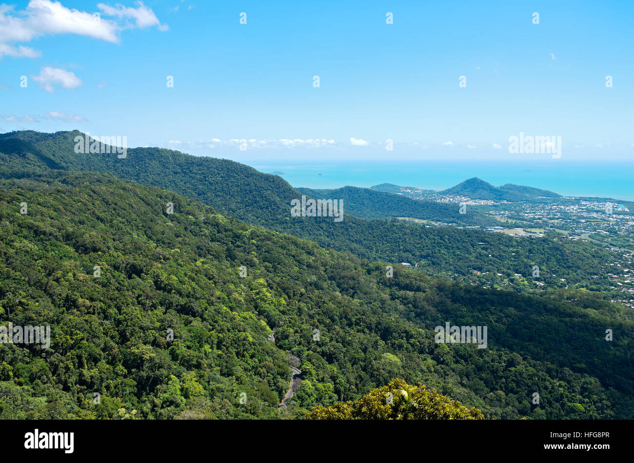 aerial above rainforest canopy in barron gorge national park and coral sea coastline near cairns of queensland australia Stock Photo