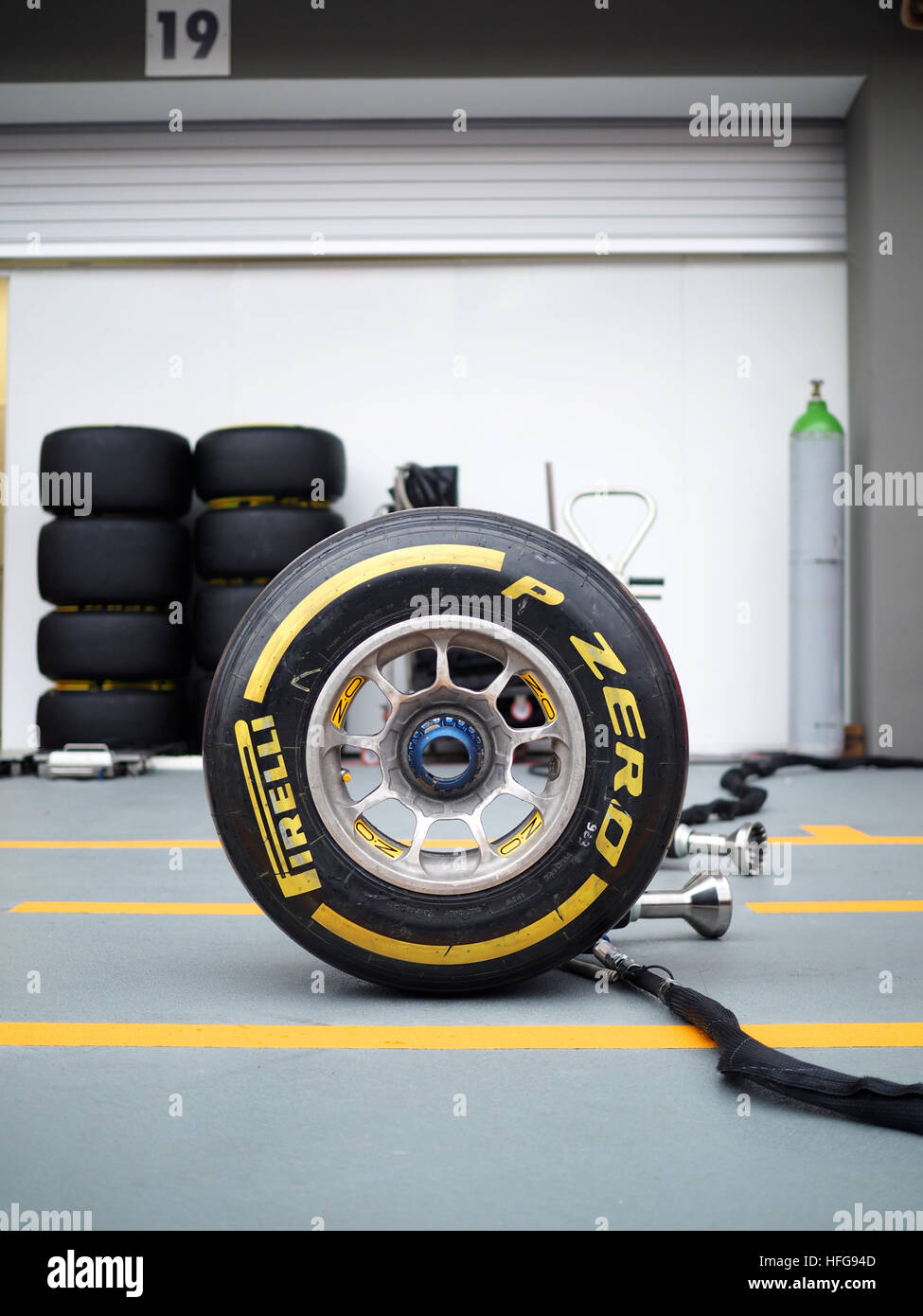Formula One F1 grand prix racing motor sport P Zero tires wheels gold  Pirelli yellow stripe Stock Photo - Alamy