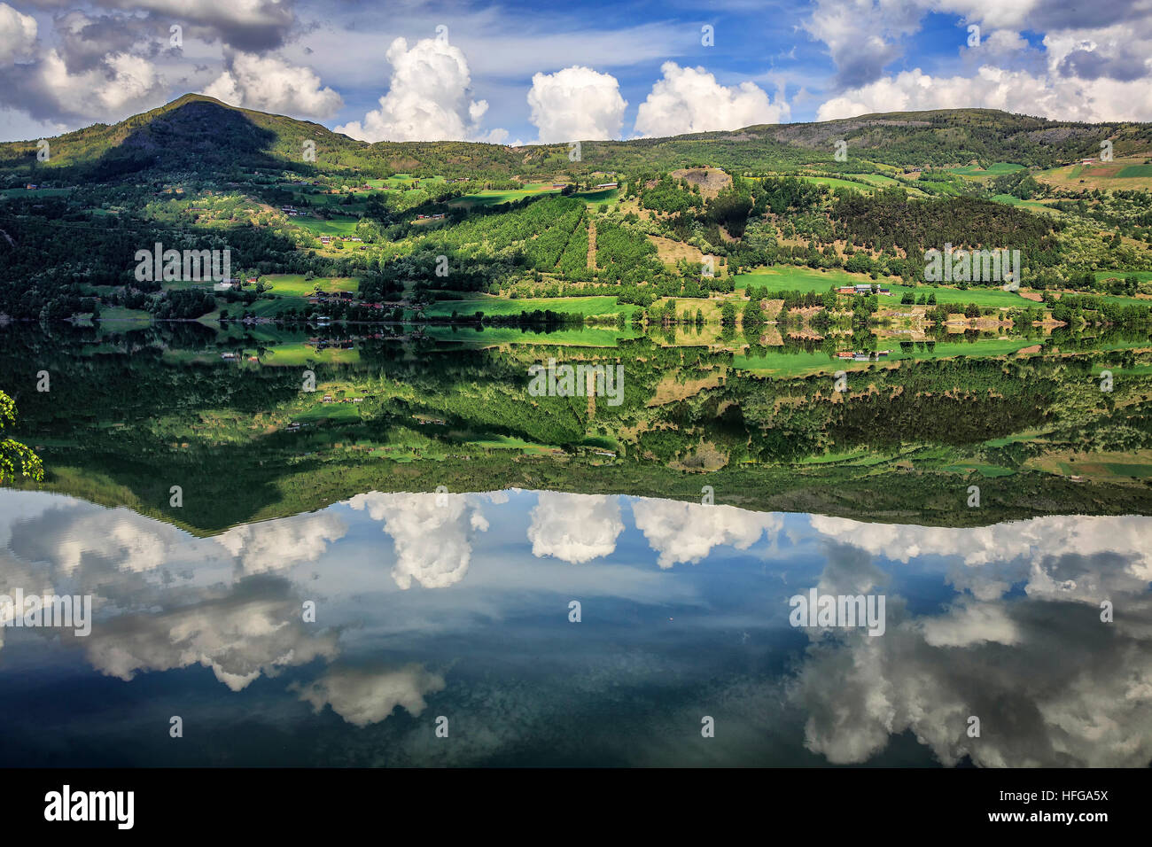 Almost perfect reflections on Lake Vagavatnet, Oppland, Norway Stock Photo