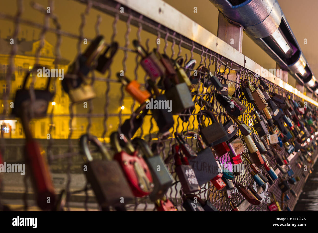 Just some of the padlocks which had been inscribed & locked onto the new bridge over the Vistula river - to symbolise love & relationships. Stock Photo