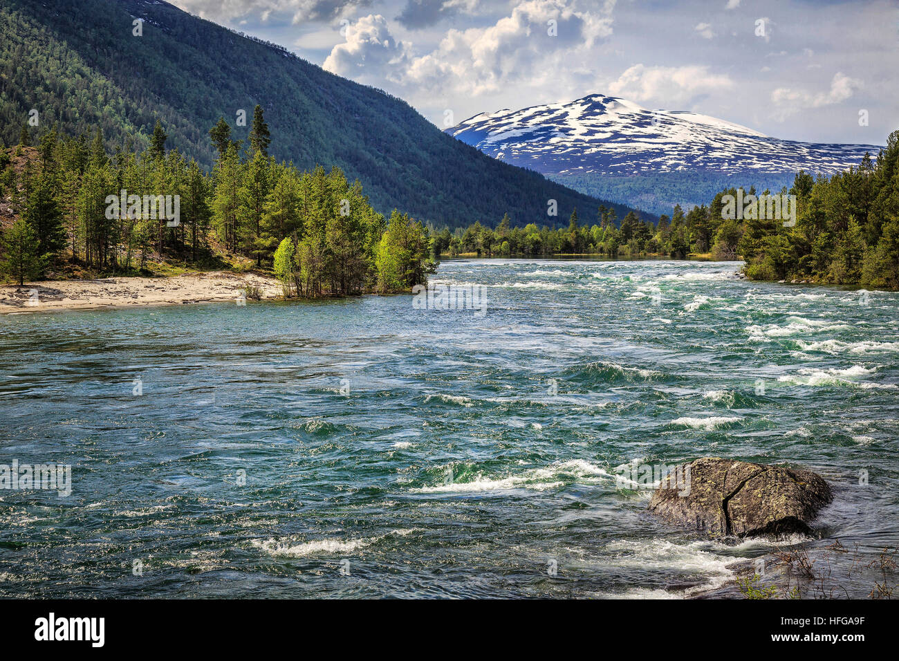 The full Otta River fed from the thawing snow and ice in Spring Stock Photo  - Alamy