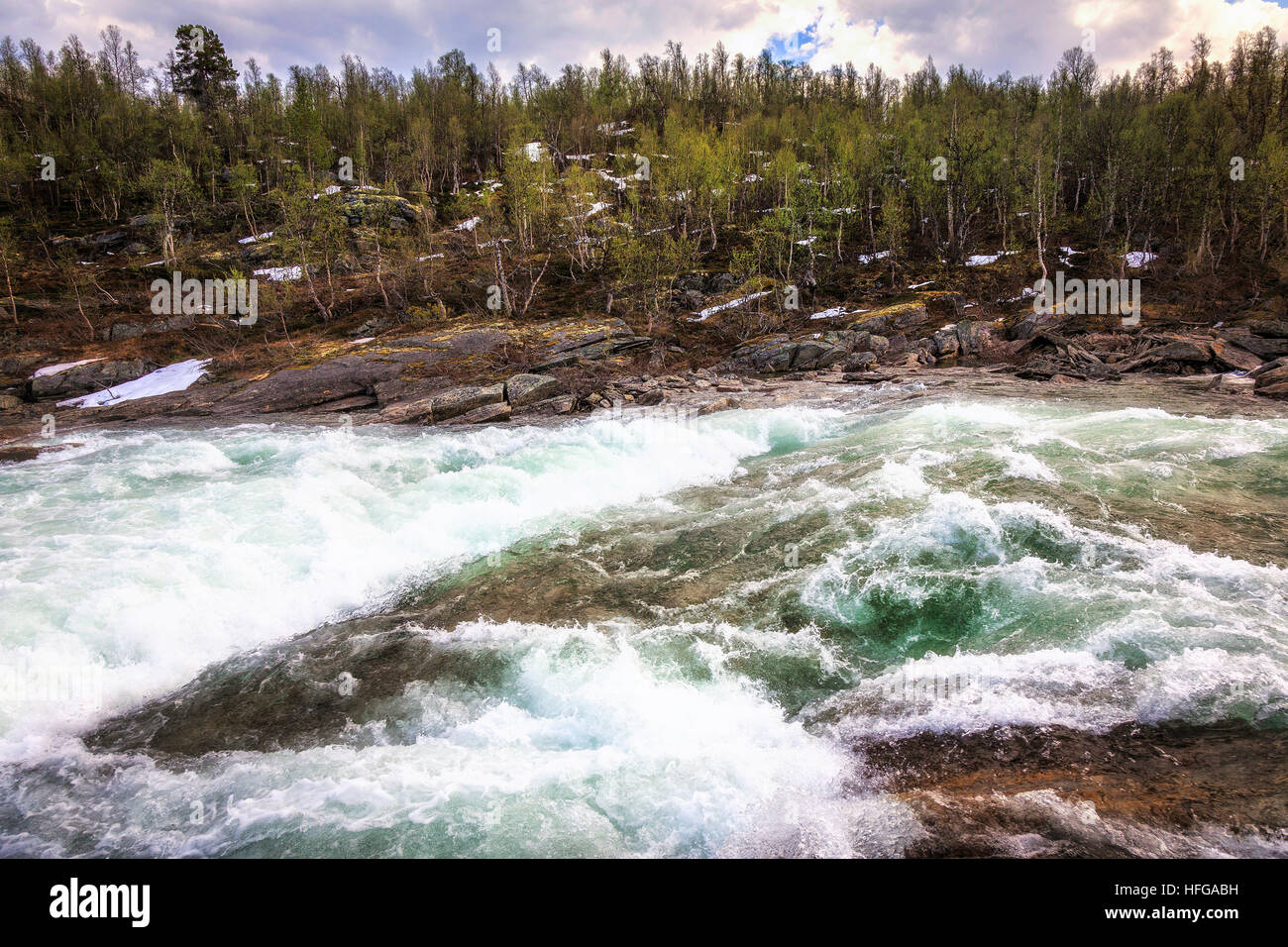 The full Otta River fed from the thawing snow and ice in Spring Stock Photo  - Alamy