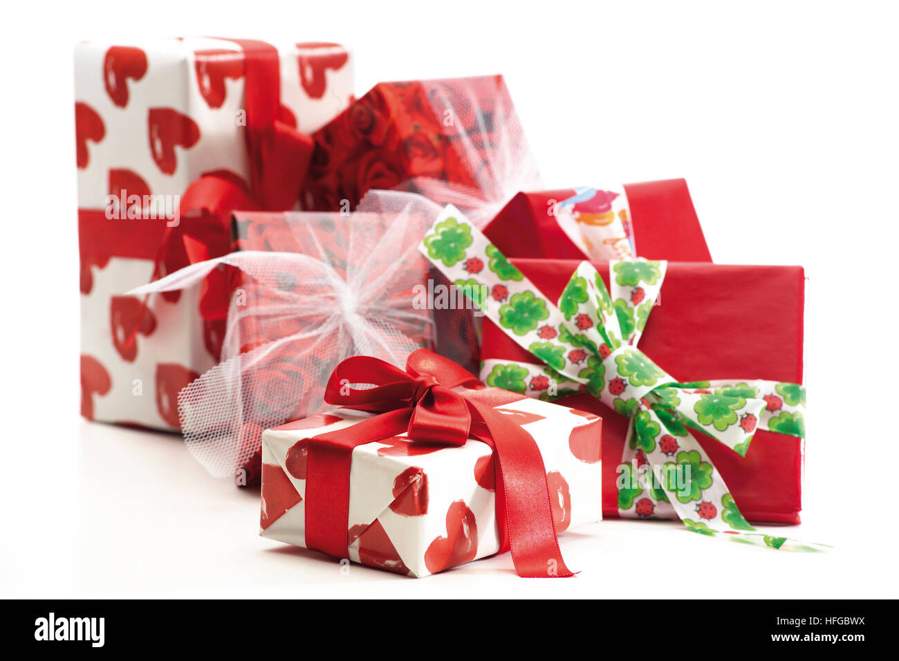 Colourful gifts wrapped with bows Stock Photo