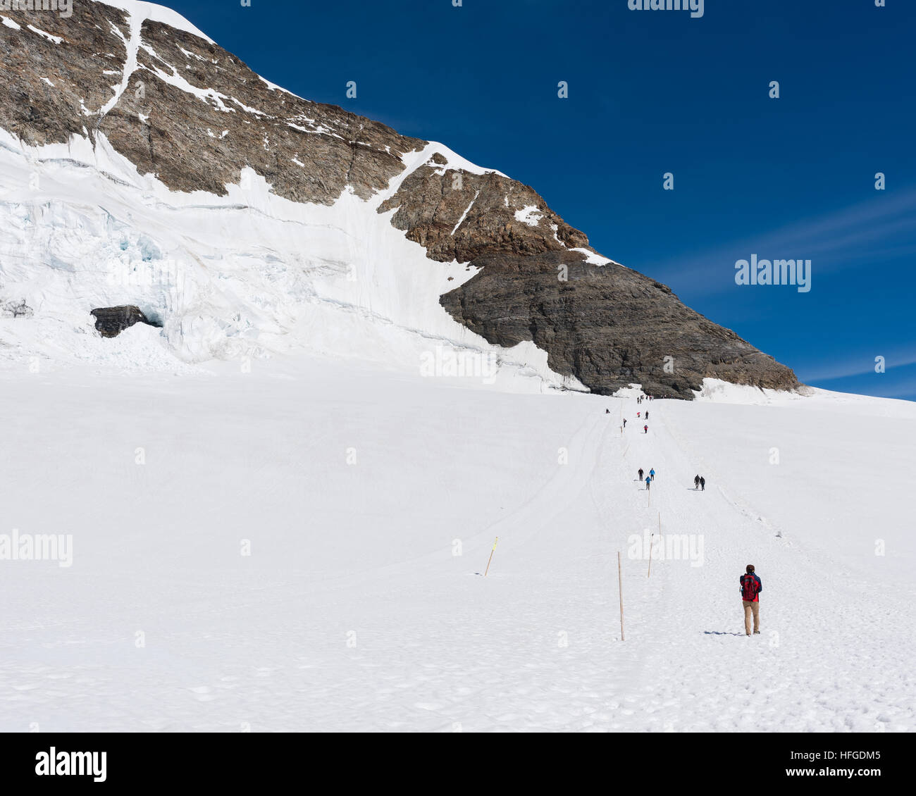 Snow covered peak of Jungfraujoch Switzerland in the summer with deep