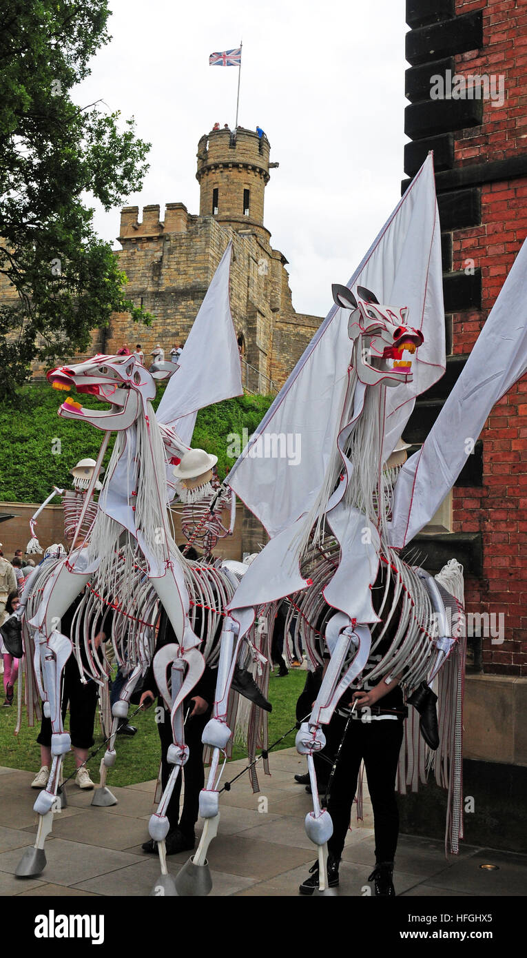 Giant Horse puppets and puppeteers waiting to parade to commemorate the centenary of the Battle of the Somme. 16th July 2016 Lincoln Castle. Stock Photo