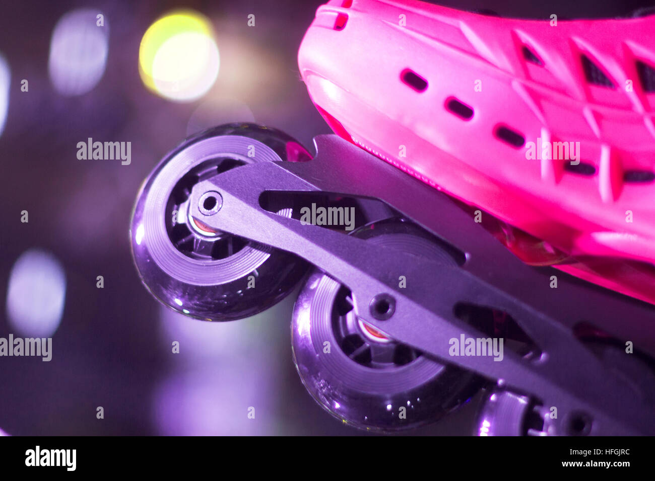 Freestyle pink ladies inline skates boots and wheels in retail store