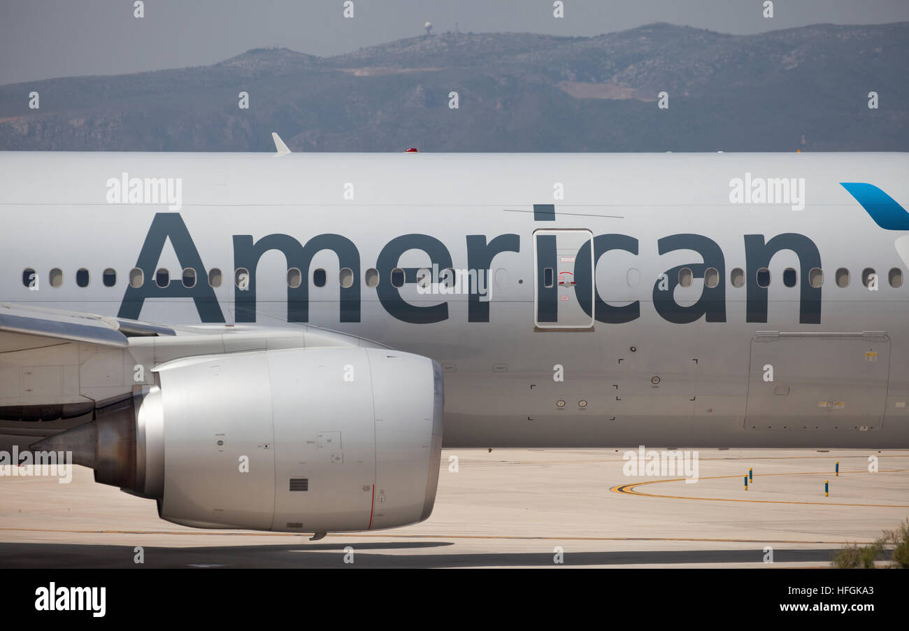 Engine and fuselage of an American Airlines Boeing 777-200ER on runway prior to take off from El Prat Airport in Barcelona Stock Photo