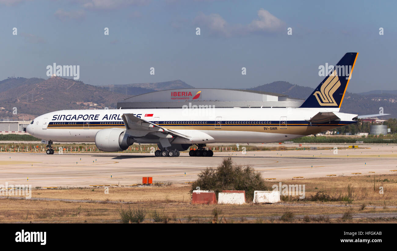 Singapore Airlines Boeing 777-300ER on runway prior to take off from El Prat Airport in Barcelona, Spain. Stock Photo