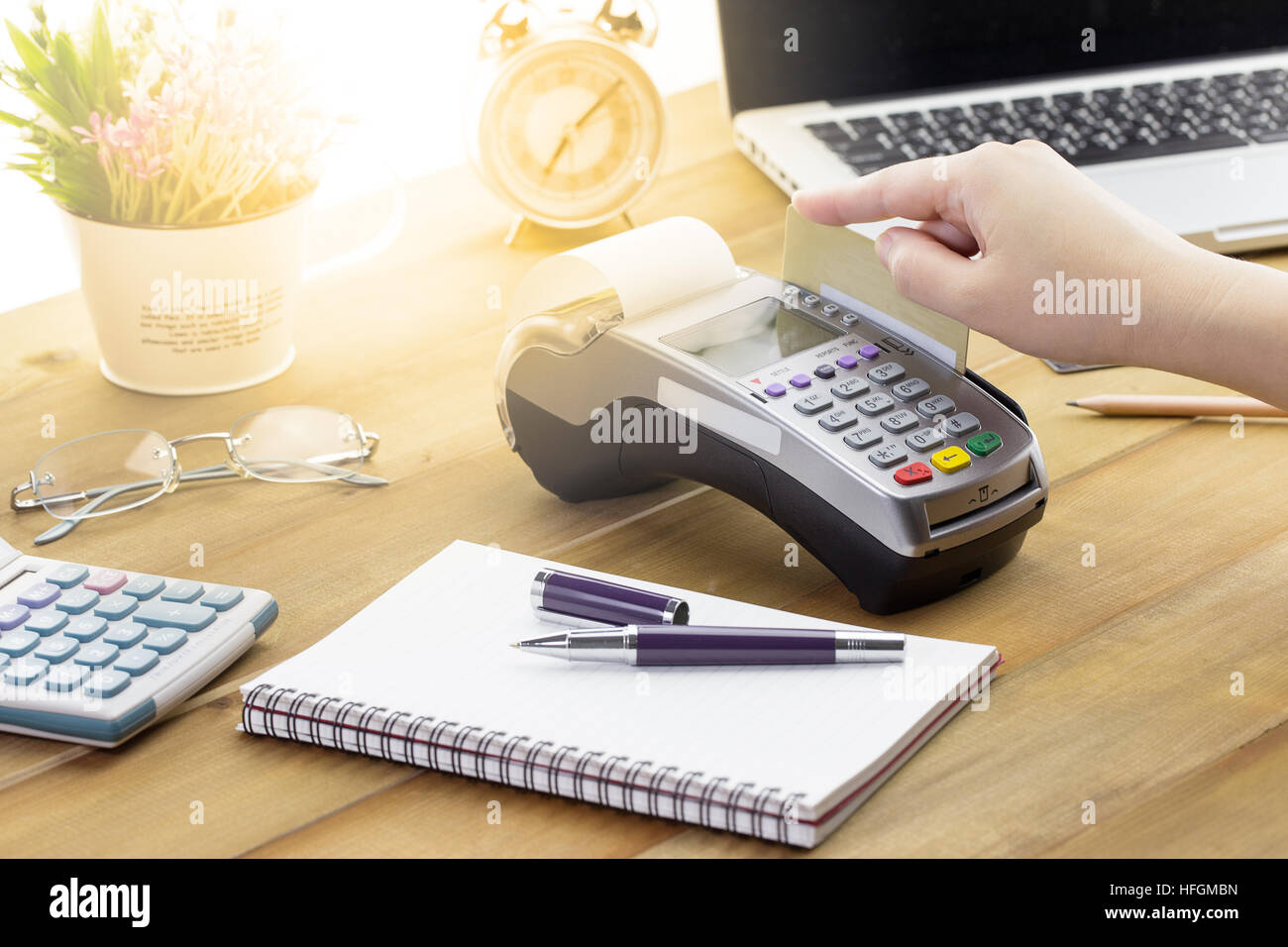 Credit Card Terminal or EDC on cashier wooden table in the store with