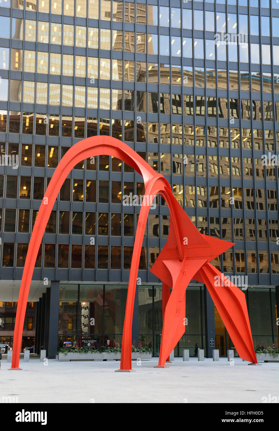 The 1974 sculpture Calder's 'Flamingo' dominates Federal Plaza in front of the Kluczynski Federal Building on Dearborn Street. Stock Photo