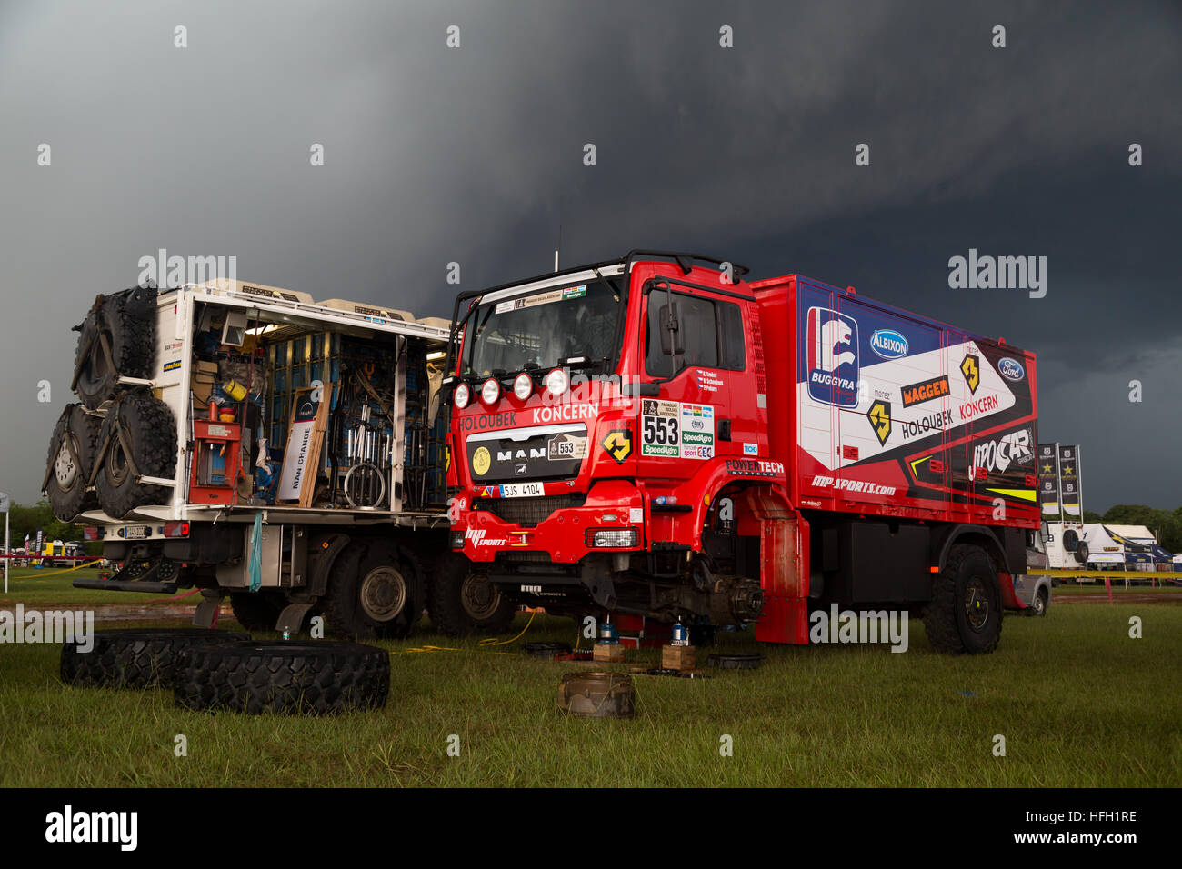 Asuncion, Paraguay. 30th December, 2016. View of #553 - Mp-Sports (driver: Karel Trneny) truck under heavy clouds, seen during the technical scrutineering day at 2017 Dakar Rally waiting park, Nu Guazu airbase, Luque, Paraguay. Credit: Andre M. Chang/Alamy Live News Stock Photo