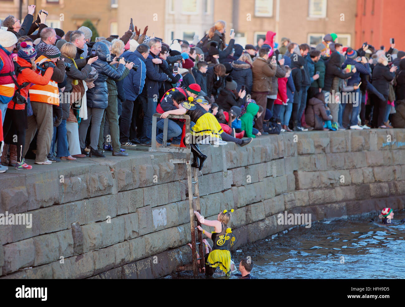 New Years Day 'Dook' Broughty Ferry, Dundee, UK. 1st Jan, 2017. swimmers in fancy dress prepare to jump into freezing waters of The River Tay © Derek Allan/Alamy Live News Stock Photo