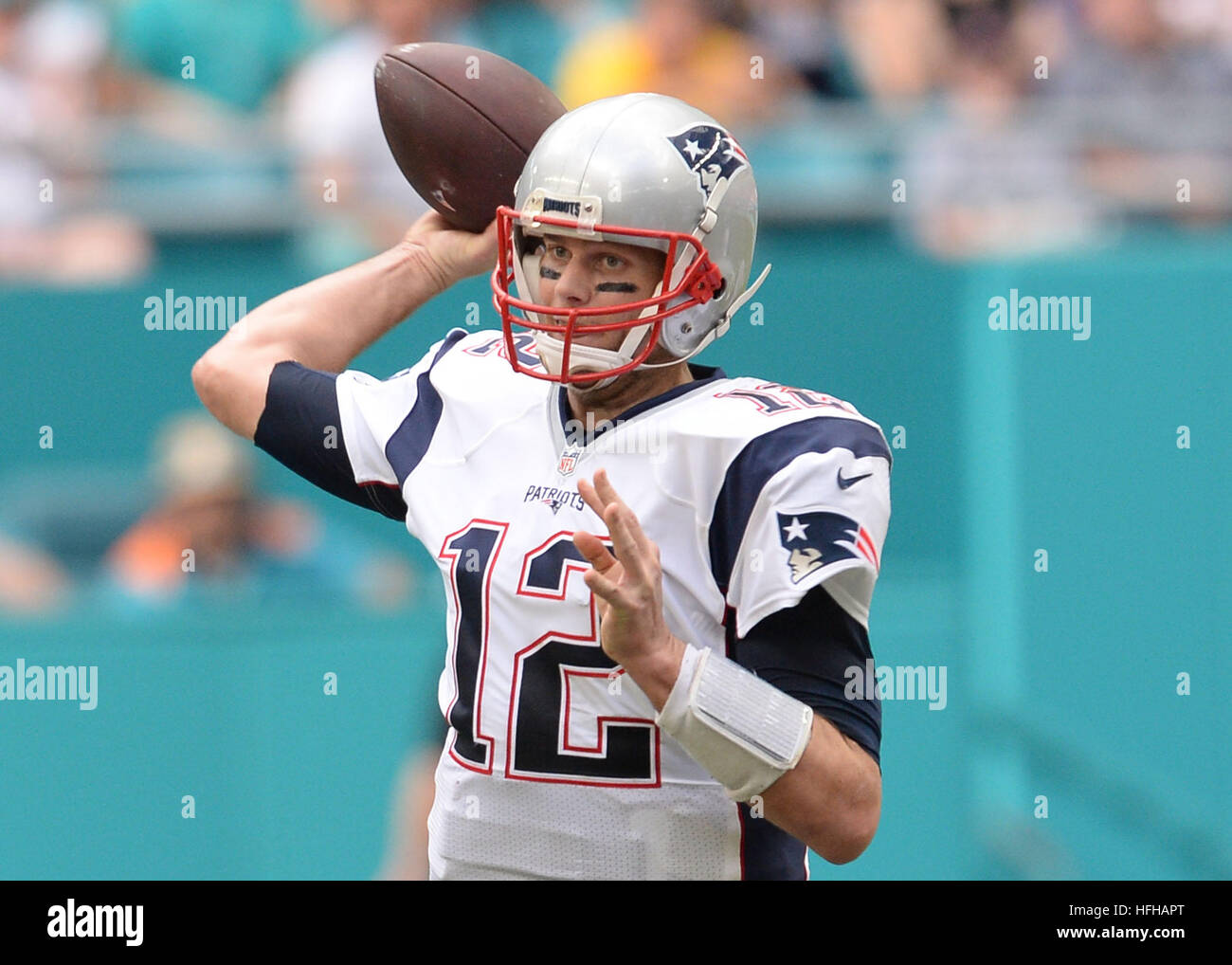 Miami Gardens, Florida, USA. 01st Jan, 2017. New England Patriots quarterback Tom Brady (12) in action during the first half in a game between the Miami Dolphins and the New England Patriots on January 01, 2017, at Hard Rock Stadium in Miami Gardens, FL. © Action Plus Sports/Alamy Live News Stock Photo