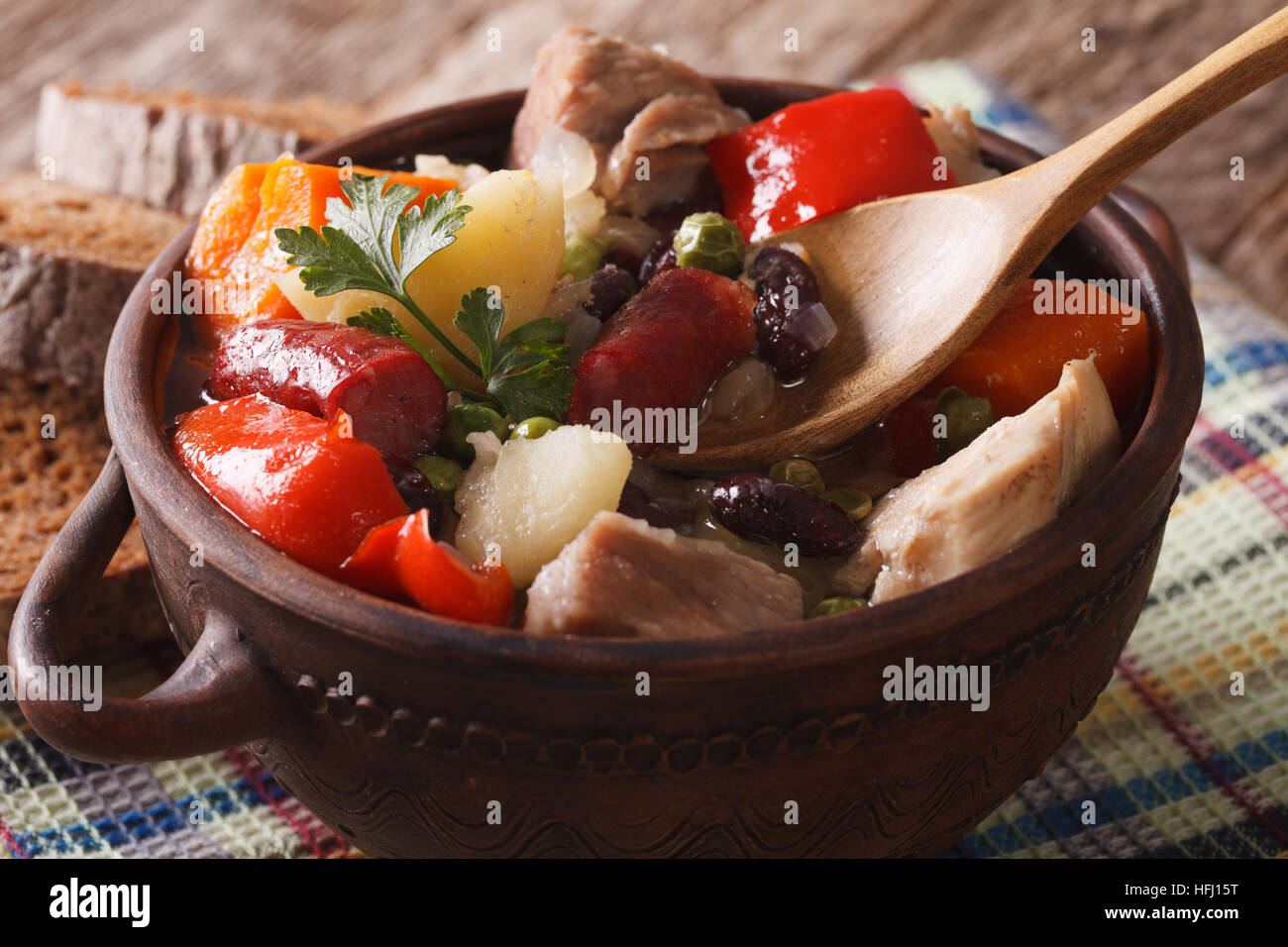 German eintopf soup with meat and vegetables closeup on the table
