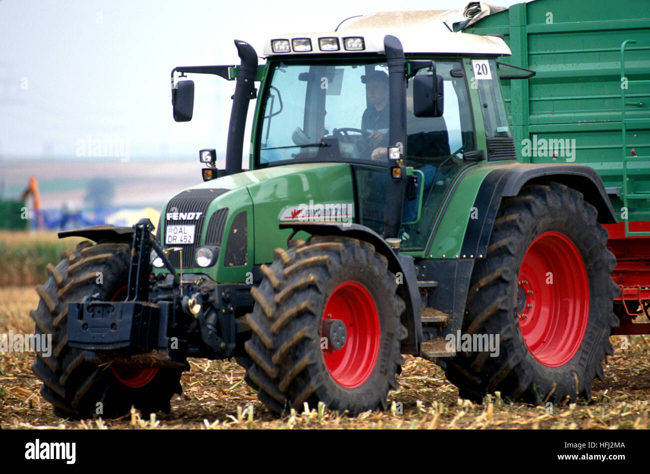 A modern European farm tractor in a German cornfield outside Wurzburg. Stock Photo