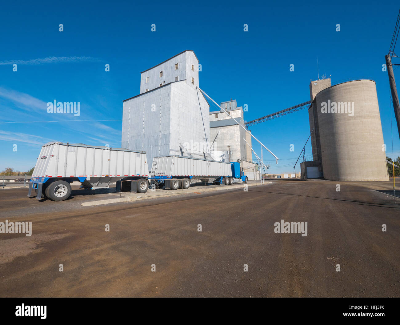 Grain elevator in Ritzville in eastern Washington state along a railroad. Stock Photo