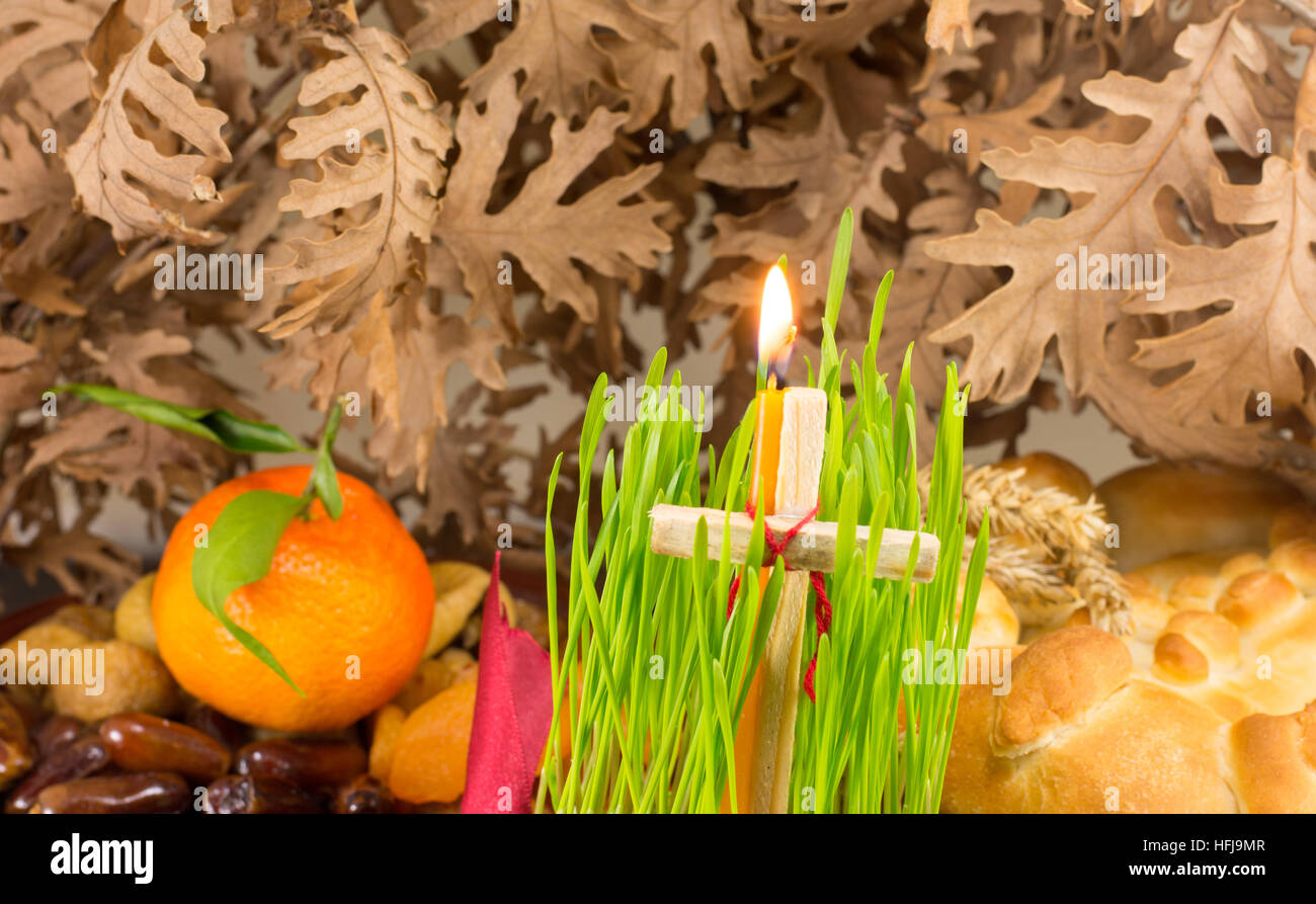 Orthodox Christmas offerings with growing green wheat Stock Photo