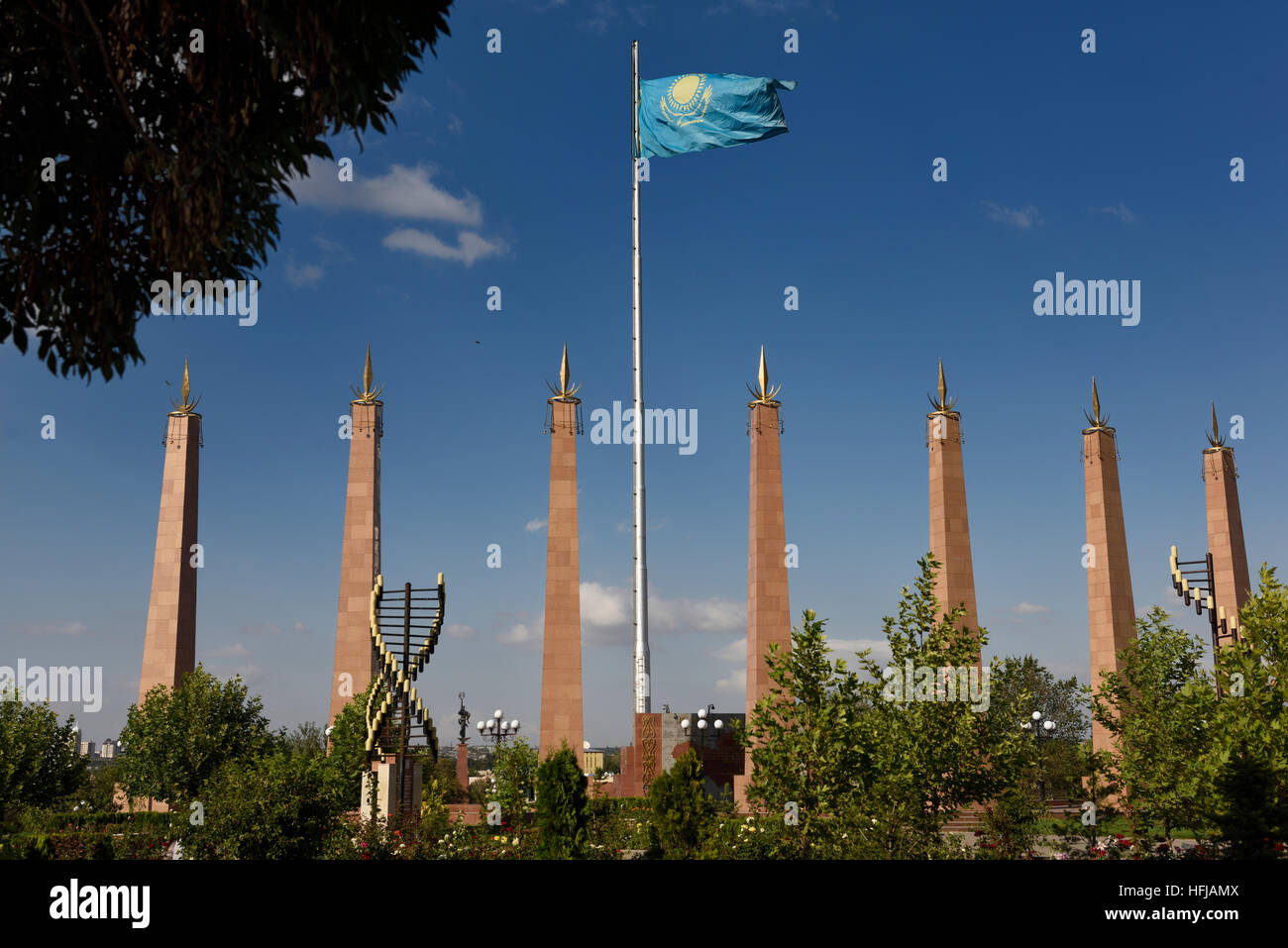 Seven granite columns and Kazakh flag in Independence Park Shymkent Kazakhstan Stock Photo