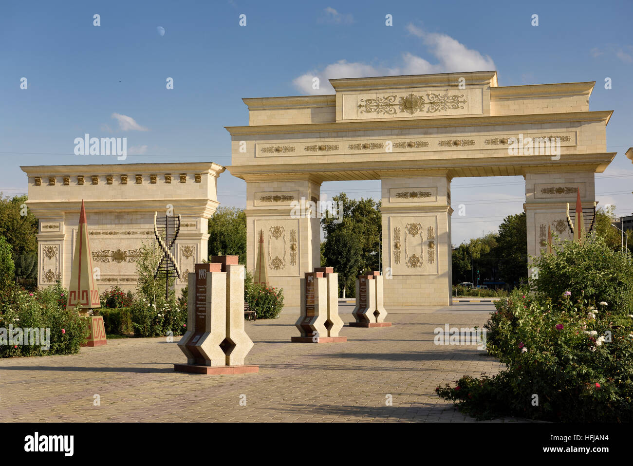 Ornate gates to Independence Park Shymkent Kazakhstan with granite steles with 20 years history 1991 to 2011 Stock Photo