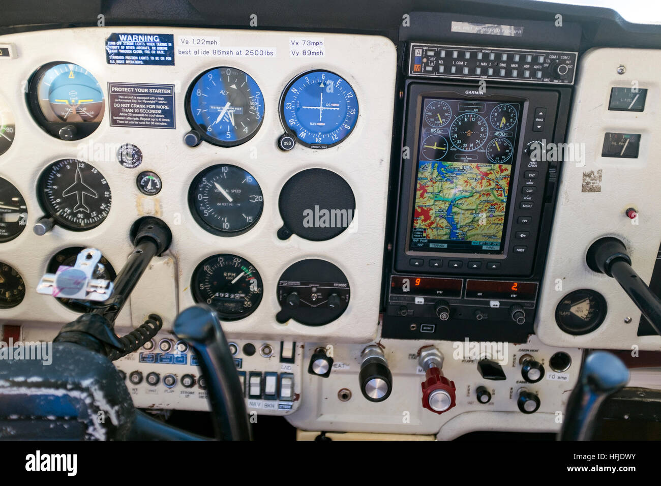 Small airplane instrument panel. Just the very basic instruments in cluding  the GPS in an old Cessna 172 single engine aircraft. The airplane is climb  Stock Photo - Alamy