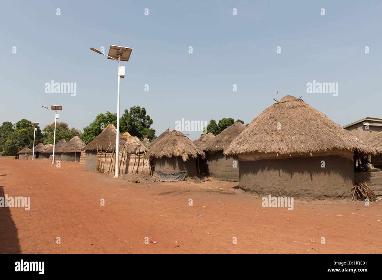 Baro village, Guinea, 1st May 2015: Solar powered street lighting, very recently installed. Stock Photo