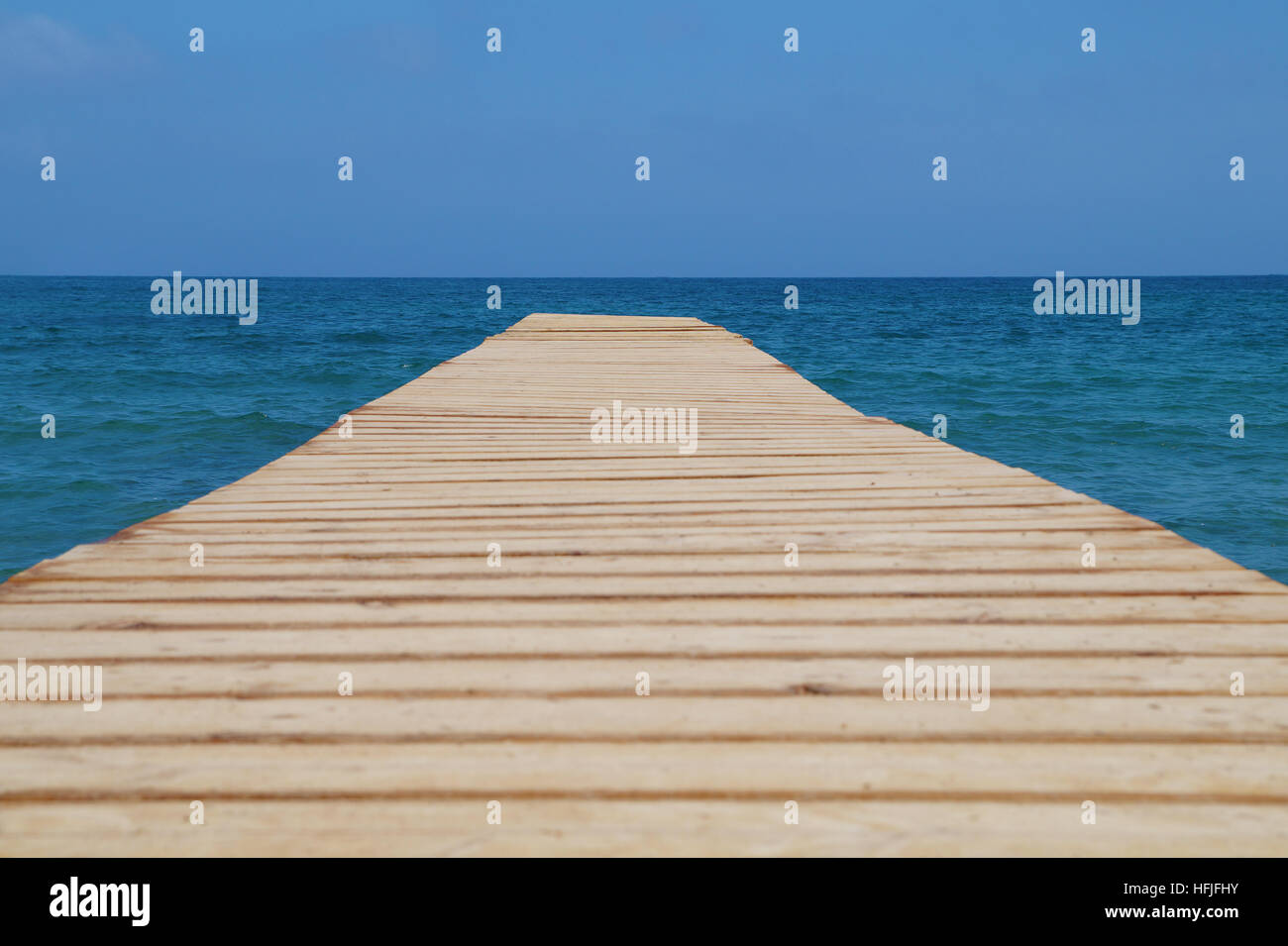 old wood bridge pier with natural background ,backdrop and multipurpose sea scene Stock Photo