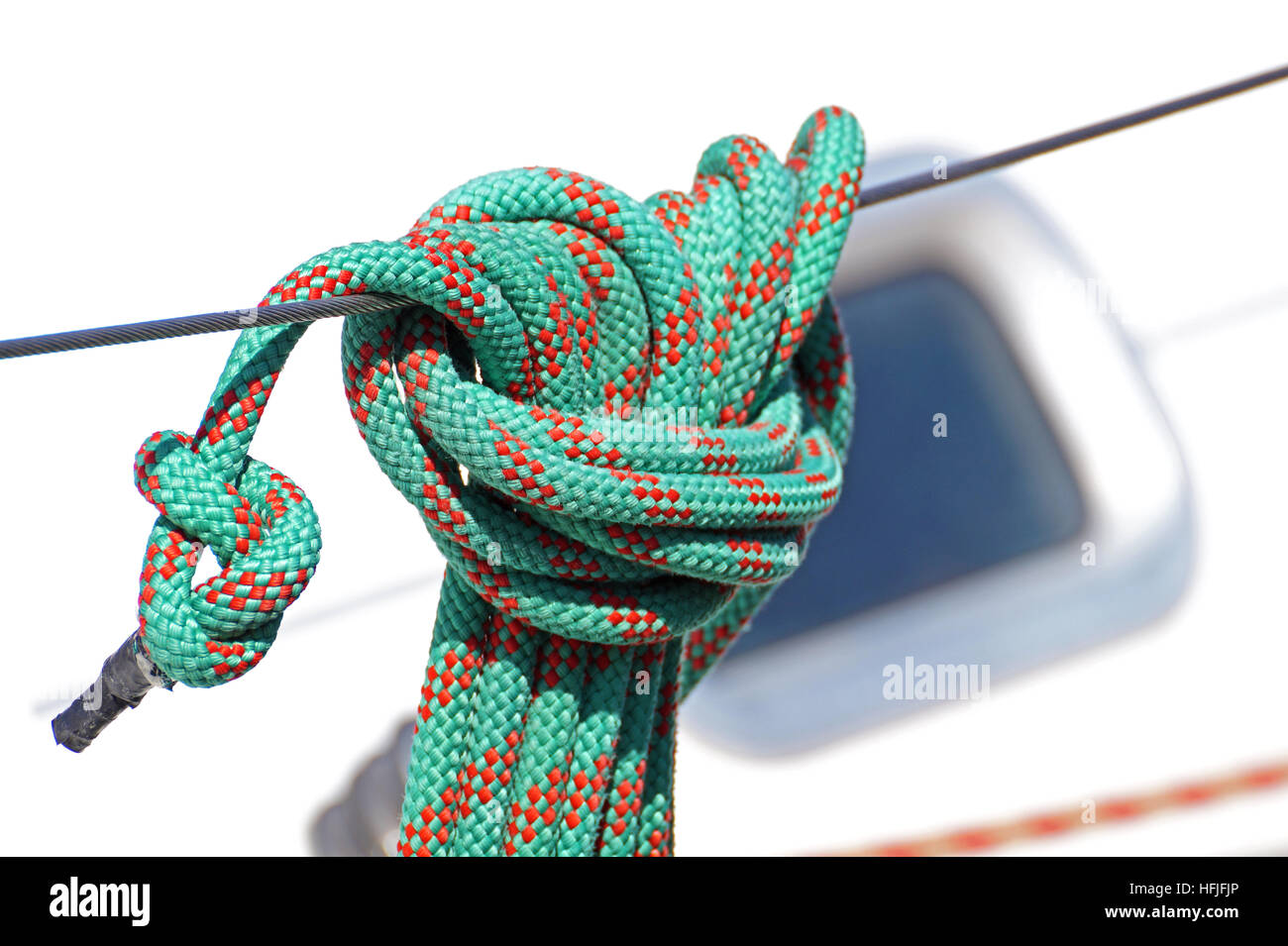 Nautical part of a yacht with cords, rigging, sail, mast, anchor, knots