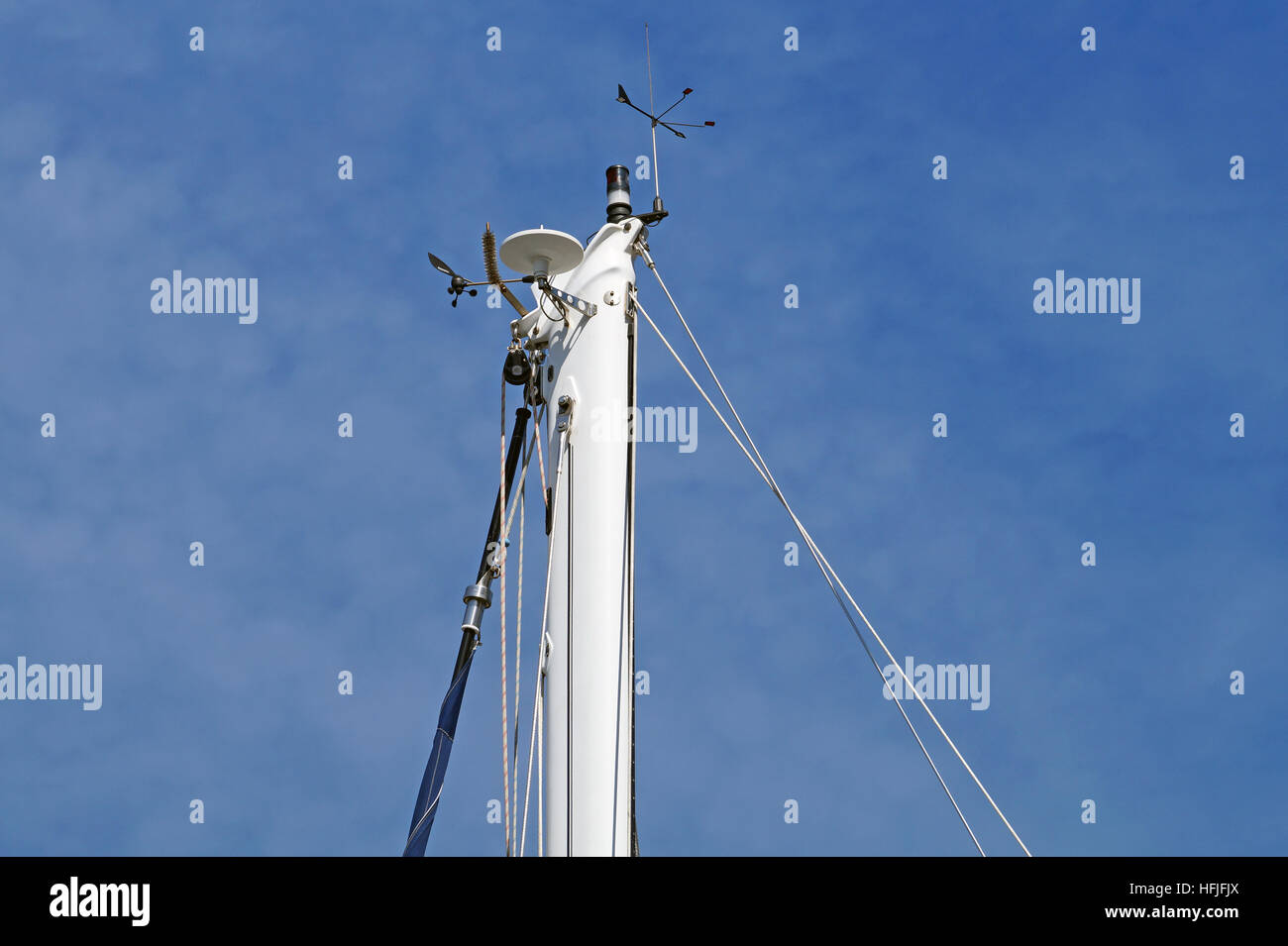 Nautical part of a yacht with cords, rigging, sail, mast, anchor, knots . Stock Photo