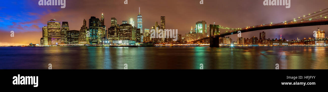Brooklyn Bridge over East River at night in New York City Manhattan ...