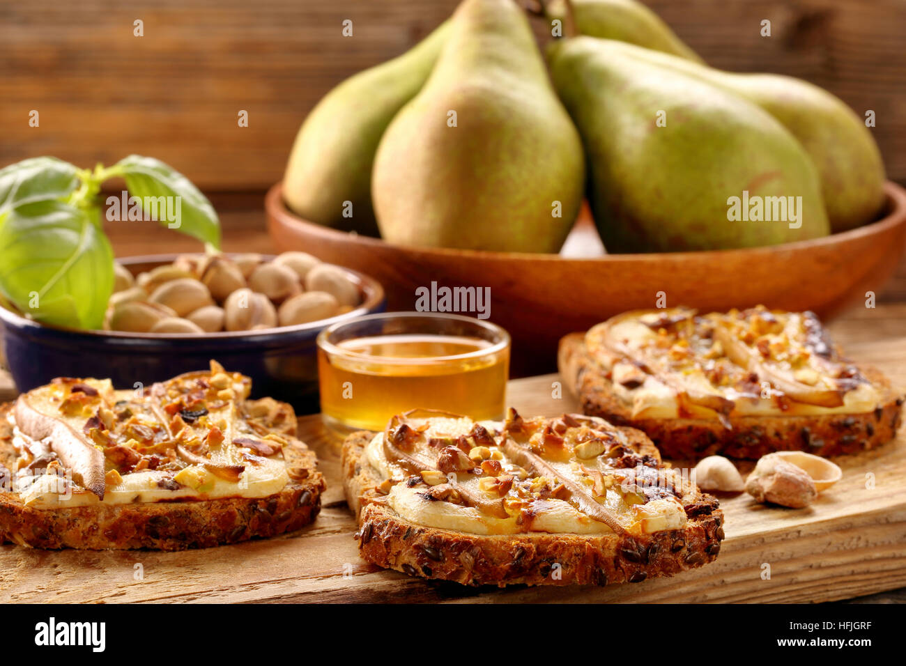 Breakfast crispy toast sandwich with pears blue cheese pistachios and