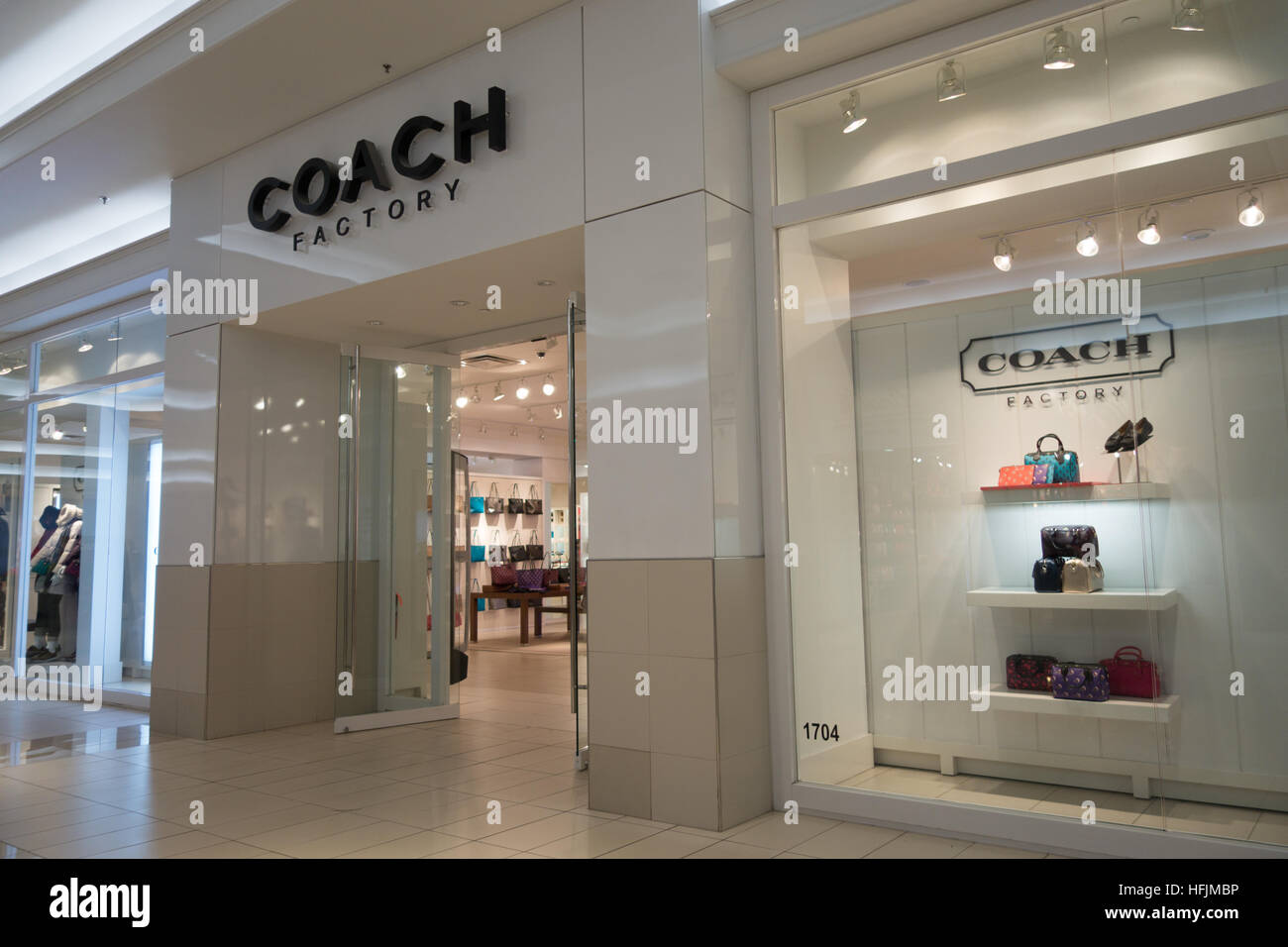 coach outlet store handbag retailer Stock Photo