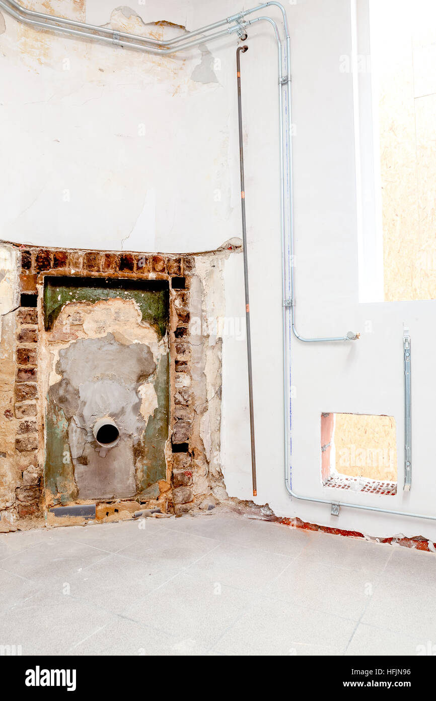 Beside the fireplace heating pipes have already been installed Stock