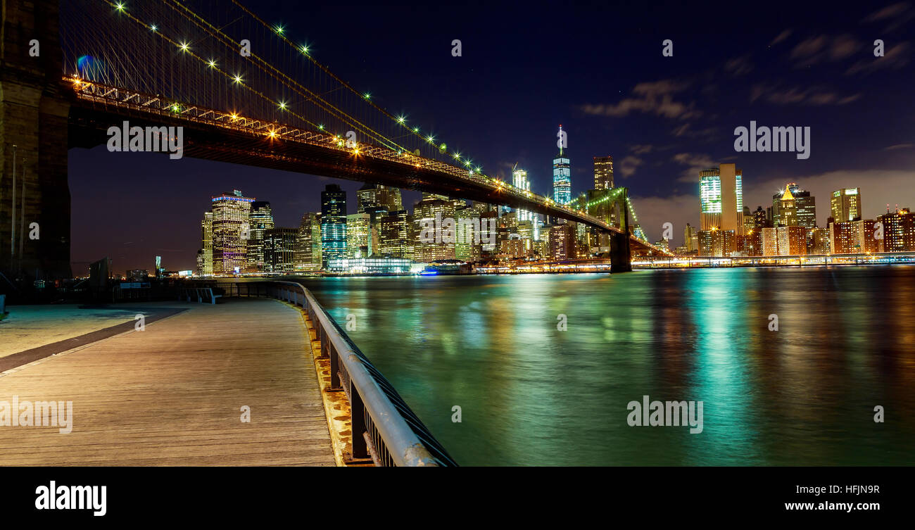 Brooklyn Bridge over East River at night in New York City Manhattan ...