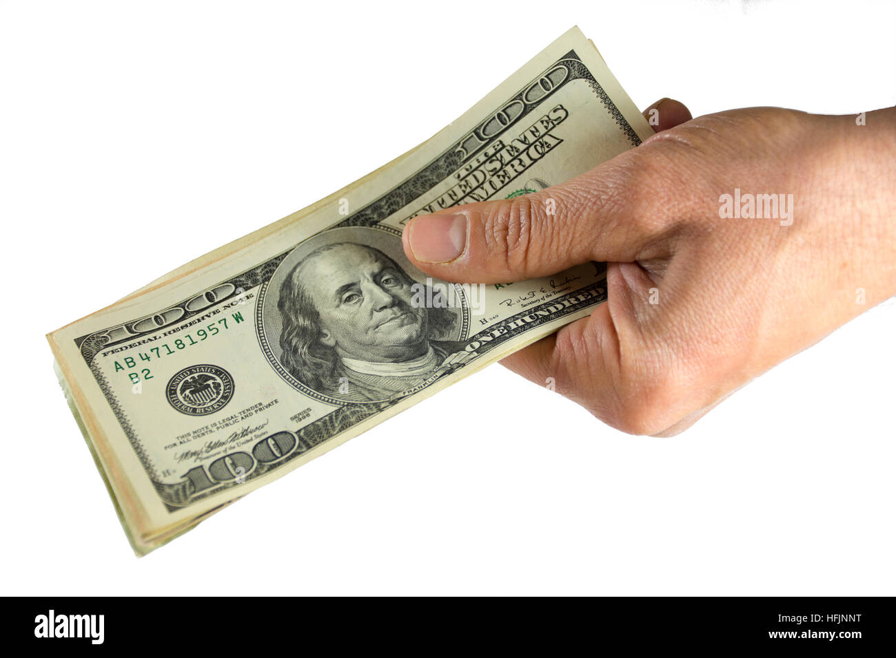 hand holding a stash of money american dollars Stock Photo Alamy
