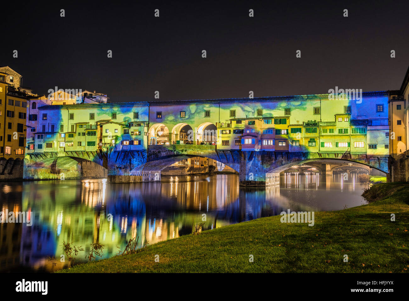 Firenze, Tuscany. The famous Ponte Vecchio illuminated by the magic lights and colors of the event 'Firenze Light Festival' Stock Photo