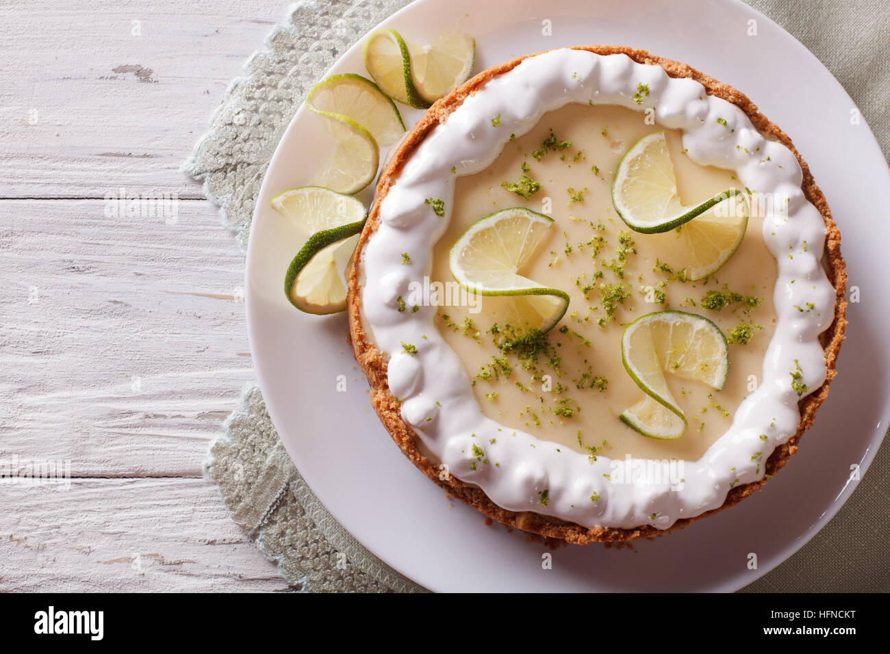 key lime pie with whipped cream closeup on the table. horizontal view