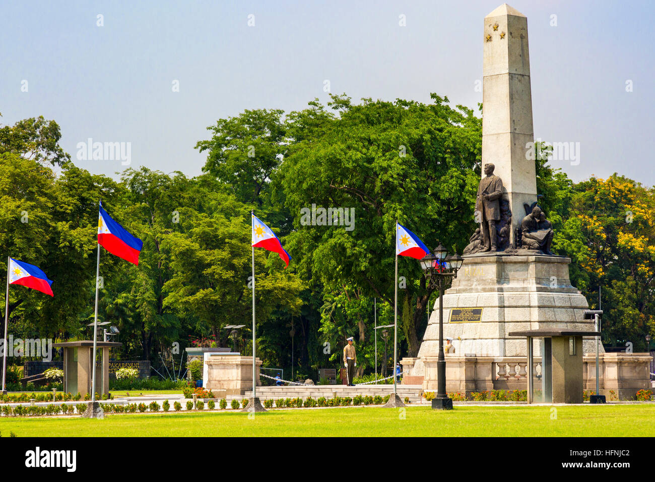 Flags, marines and monument at Rizal Park, Luneta, Manila, Philippines Stock Photo