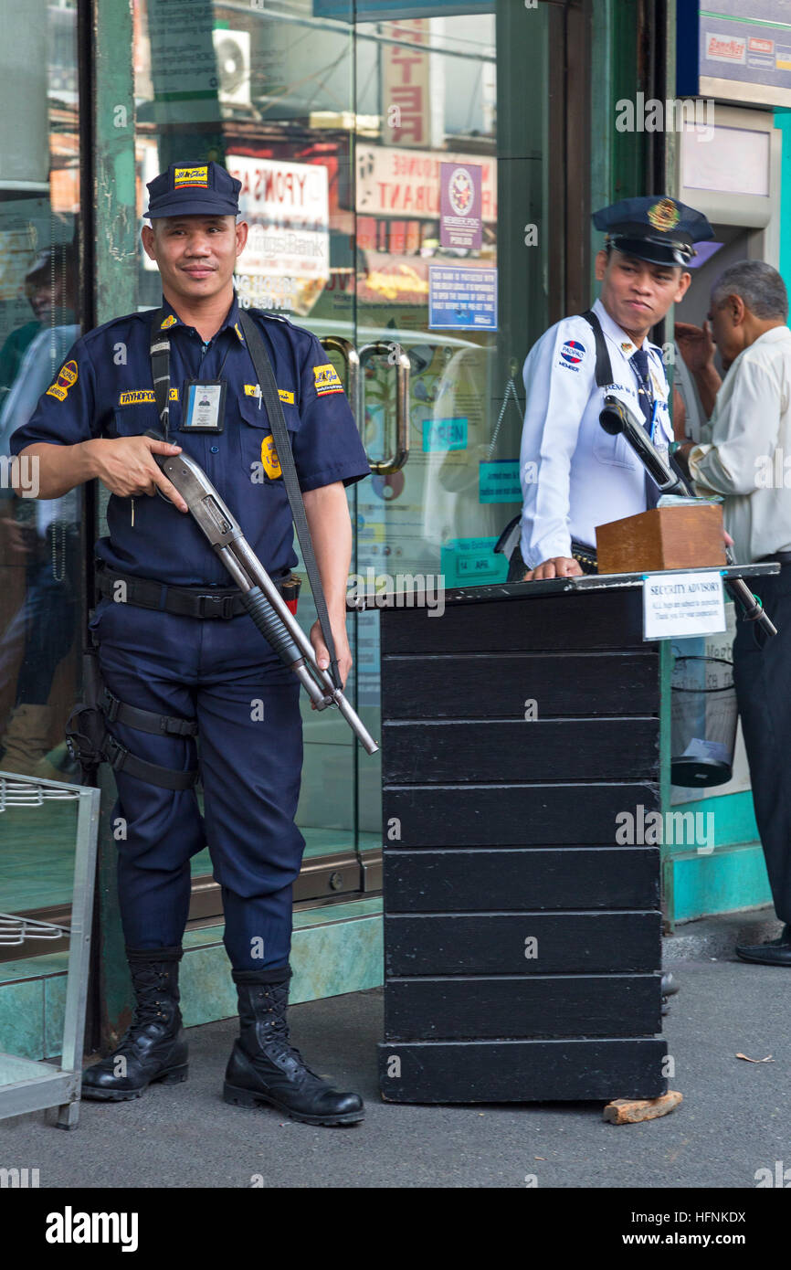 Armed security guards, Manila, Philippines Stock Photo