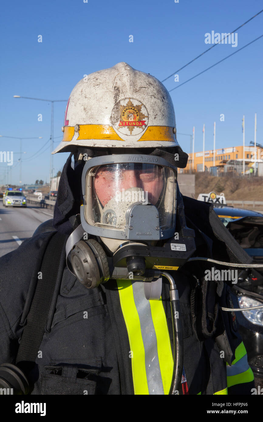 Firefighter with protective equipment Stock Photo