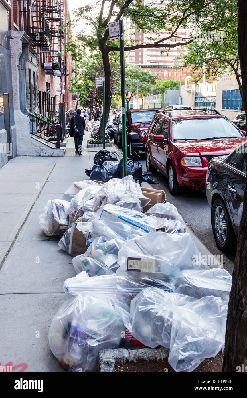 New York City,NY NYC,Manhattan,sidewalk,trash,plastic bags,curbside