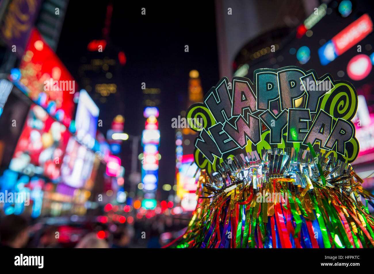 Happy New Year 2017 party hat celebrating in Times Square, New York City Stock Photo