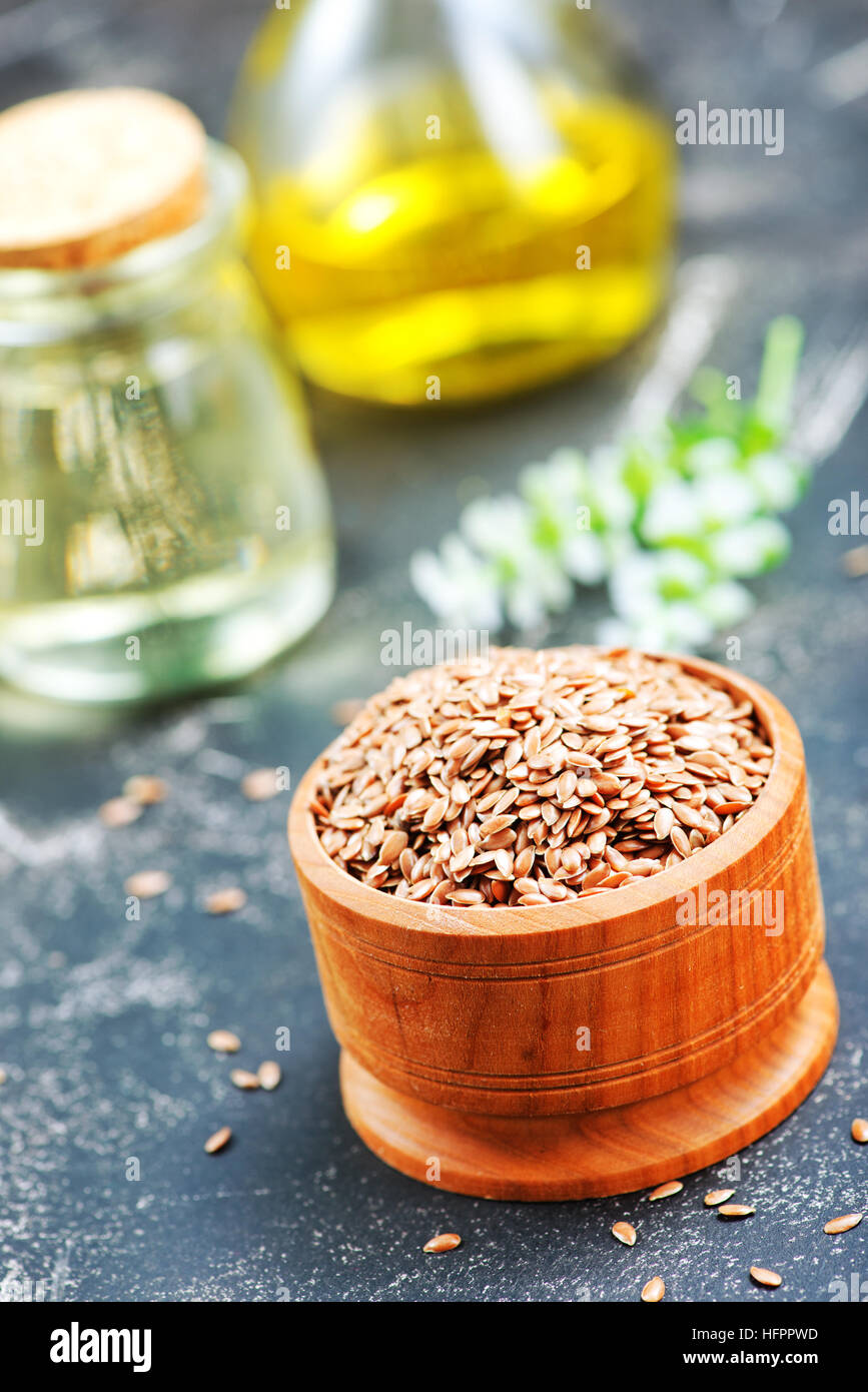 flax seed and oil on a table Stock Photo Alamy