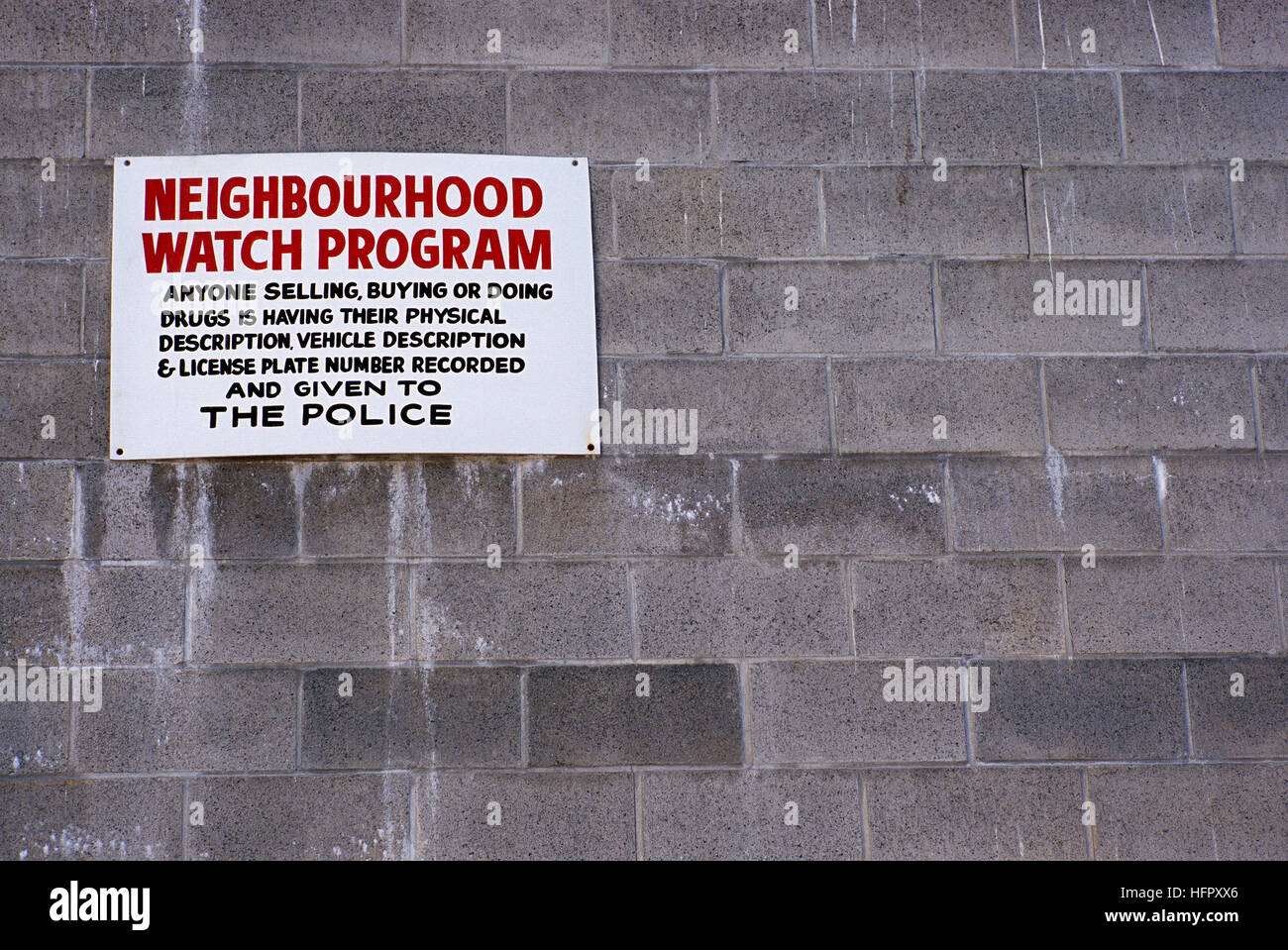 Neighbourhood Watch Program - Warning Sign to Anyone Selling, Buying or Doing Drugs will be reported to Police, Anti Crime Signs Stock Photo