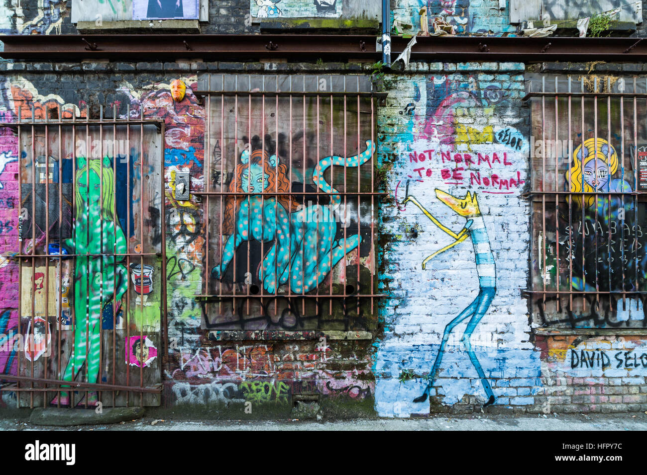 Shoreditch and Brick Lane creative graffiti and social art in east London, UK Stock Photo