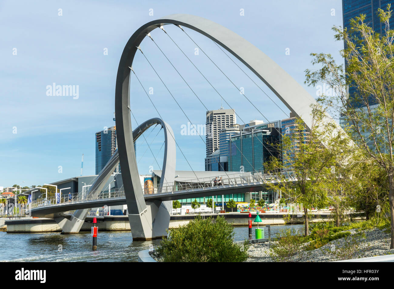 The Elizabeth Quay pedestrian bridge on the Swan River, with the city skyline beyond, Perth, Western Australia, Australia Stock Photo