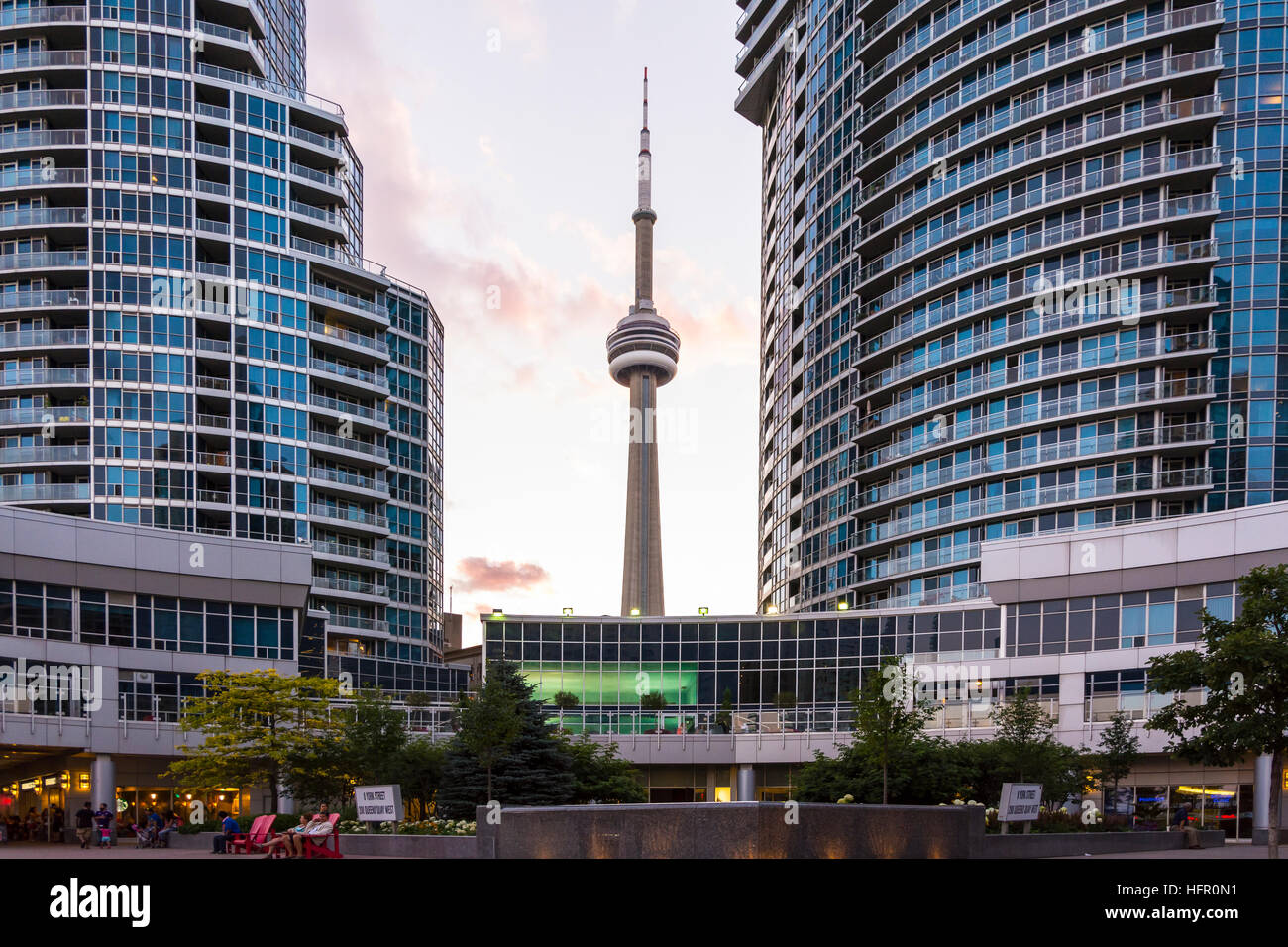 Toronto,Canada-august 2,2015:view of the CN tower in Toronto during a sunset from one of the central street of the city near the union station. Stock Photo